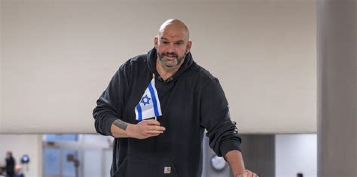 Senator John Fetterman raises the Israeli flag at a pro-Palestine gathering - SarkariResult